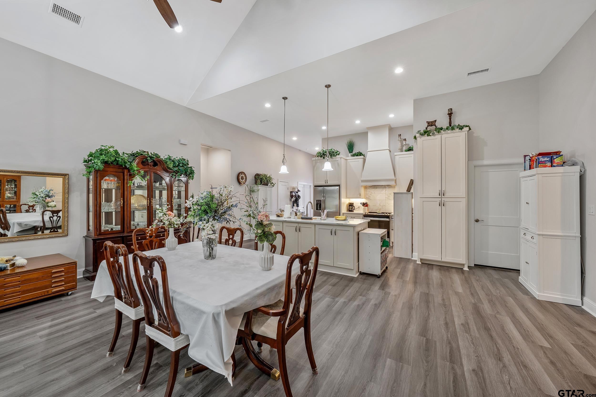9109 Long Branch Tyler, TX 75703 - Photo 10 of 34 a dining room with furniture and wooden floor