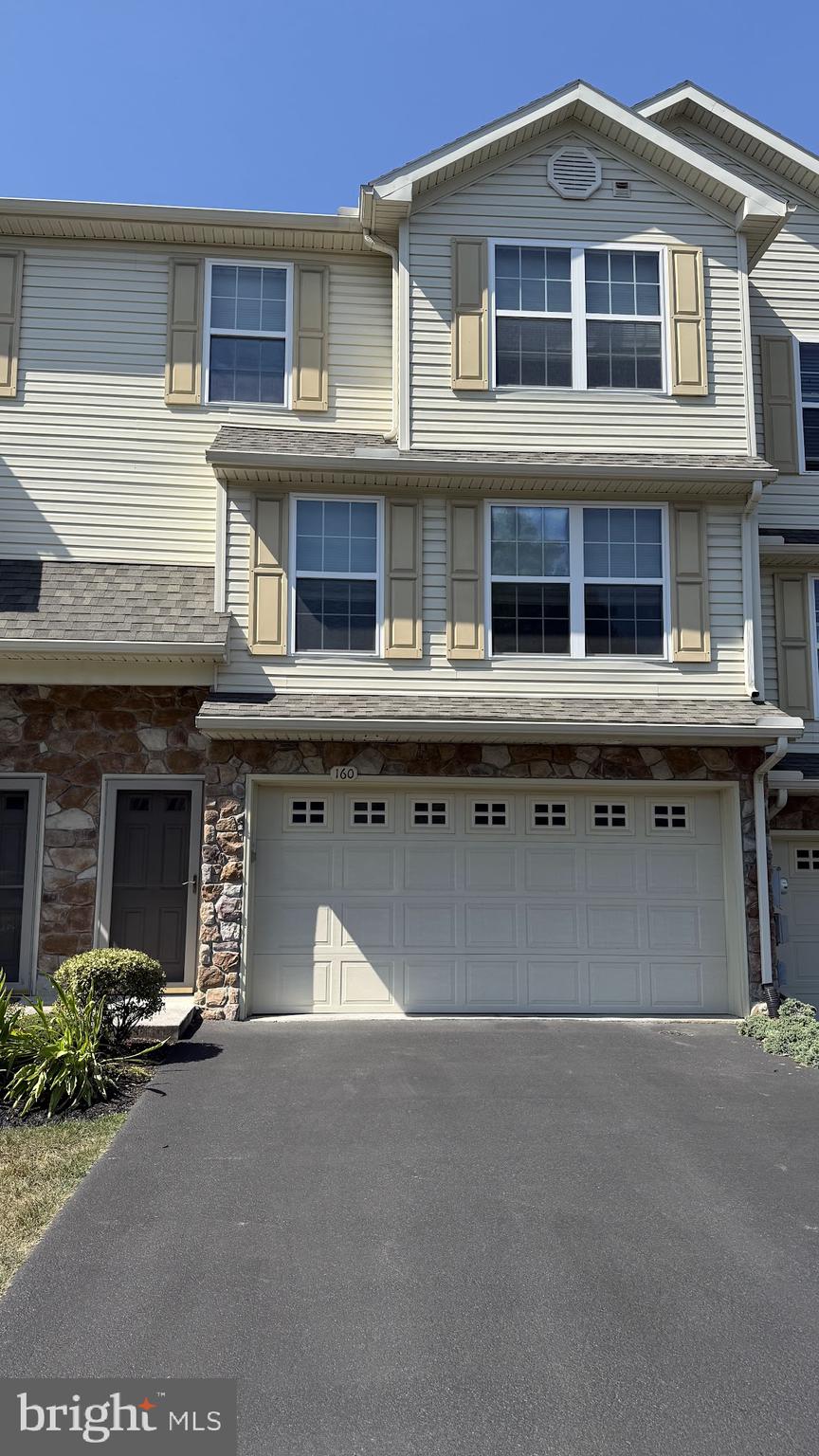 160 Mapleton Drive Harrisburg, PA 17112 - Photo 1 of 39 a front view of a building with parking