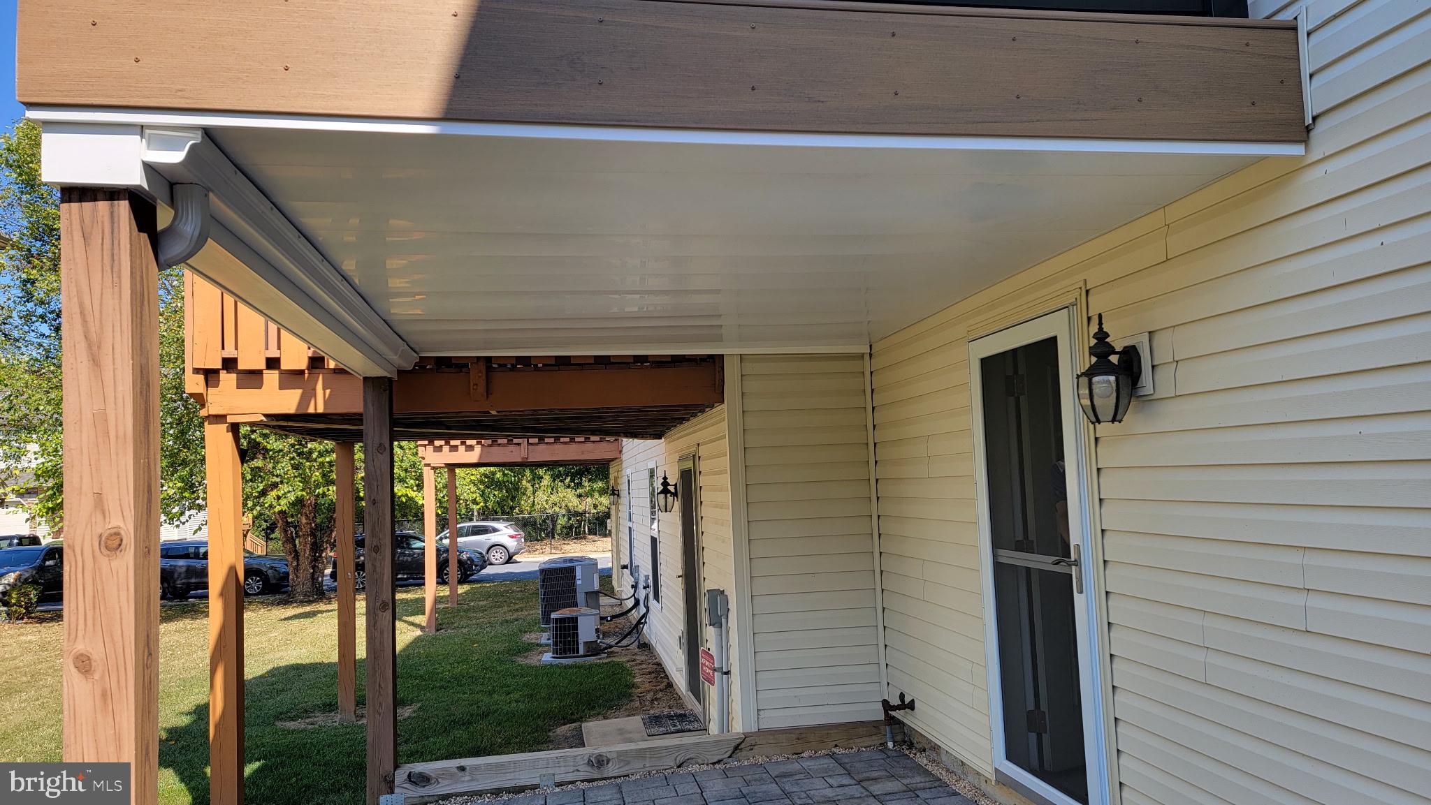 160 Mapleton Drive Harrisburg, PA 17112 - Photo 12 of 39 a view of a patio with table and chairs under an umbrella