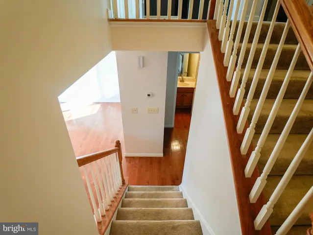 a view of a door and a window