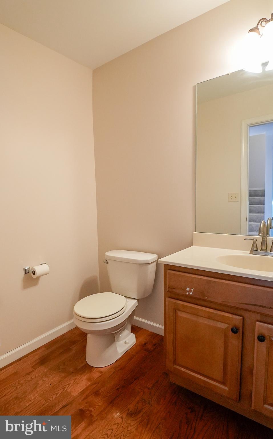 160 Mapleton Drive Harrisburg, PA 17112 - Photo 29 of 39 a bathroom with a granite countertop toilet and a sink