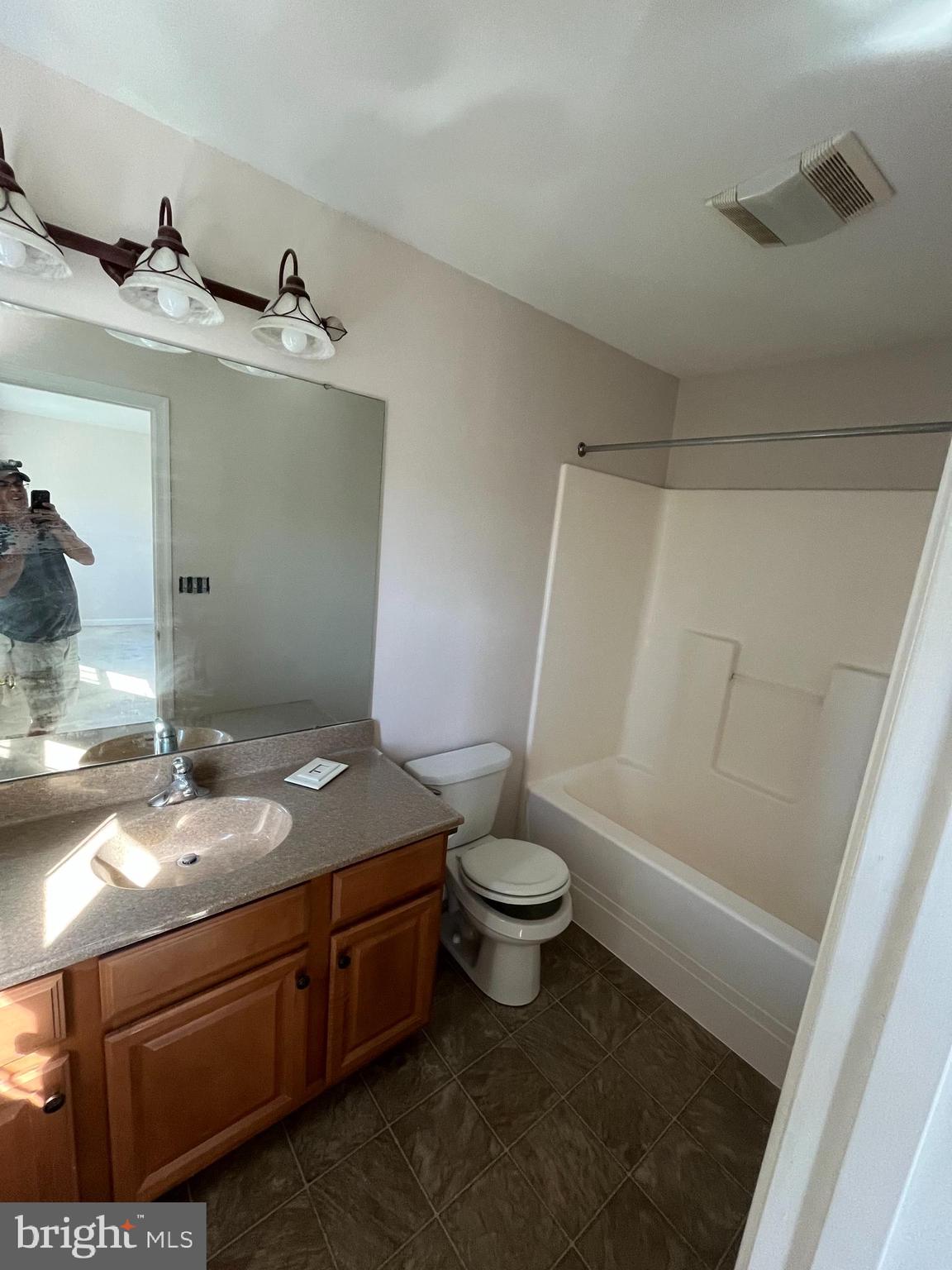 160 Mapleton Drive Harrisburg, PA 17112 - Photo 8 of 39 a bathroom with a granite countertop sink toilet and shower