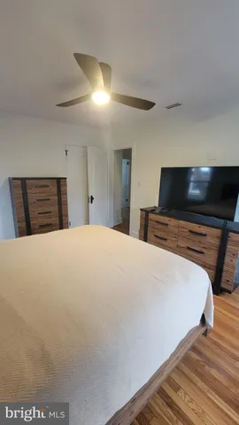 a kitchen with a refrigerator and a sink