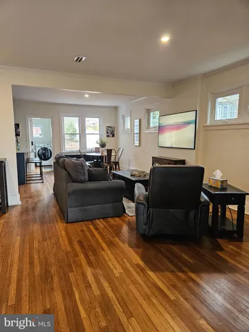 a kitchen with stainless steel appliances a refrigerator sink and microwave