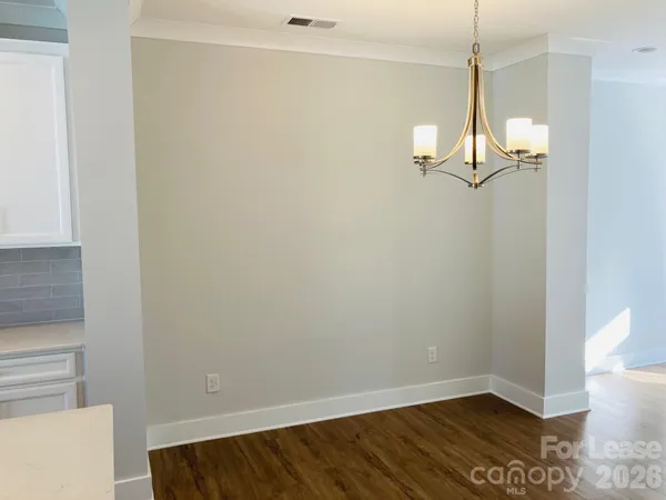 a view of small space with wooden floor