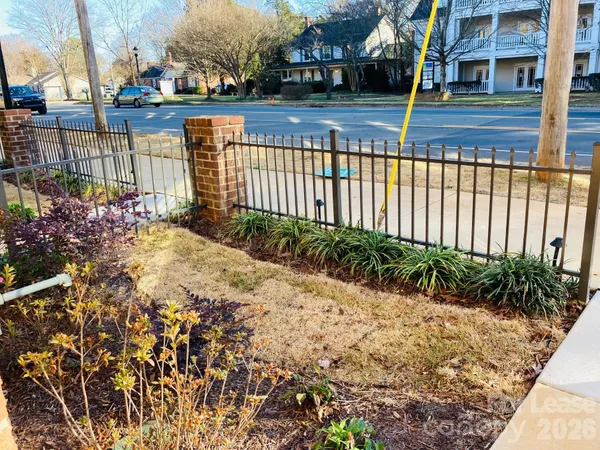 a view of a garden with pathway