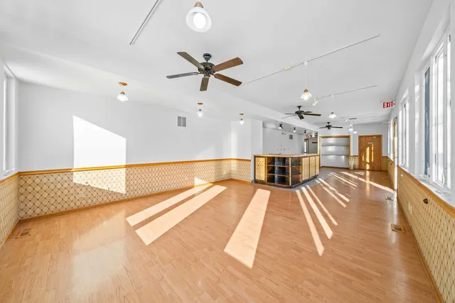 a view of a living room with a flat screen tv