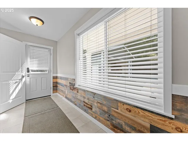 a view of outdoor space with deck and window