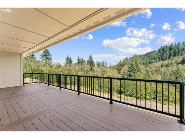 a bedroom with a bed and a tv