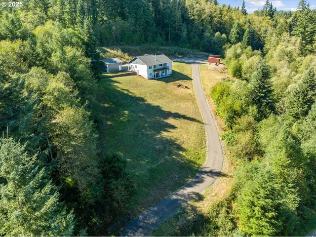 a view of a lake with a yard