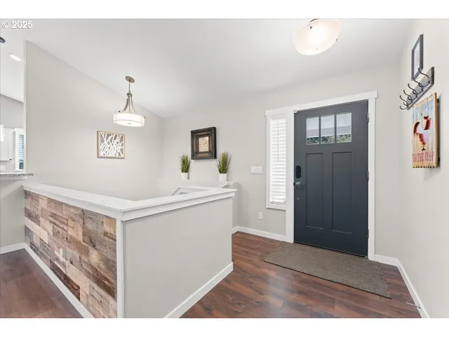 a bathroom with a sink a mirror and a toilet