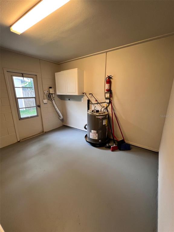 7020 Wentworth Way New Port Richey, FL 34655 - Photo 21 of 22 a view of a room with gym equipment