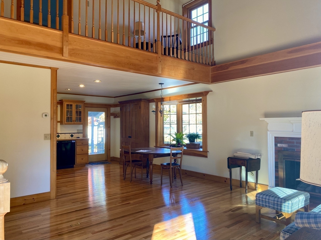 17 Jane Street Randolph, MA 02368 - Photo 3 of 18 a living room with furniture a wooden floor and a window