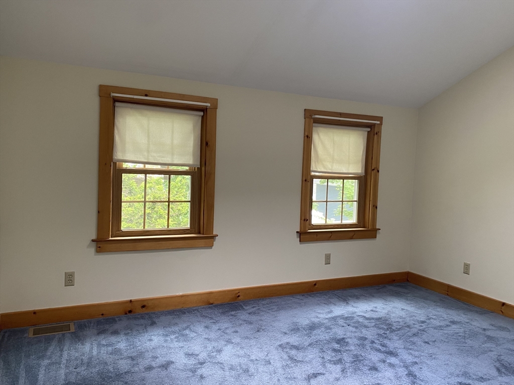 17 Jane Street Randolph, MA 02368 - Photo 7 of 18 an empty room with a window