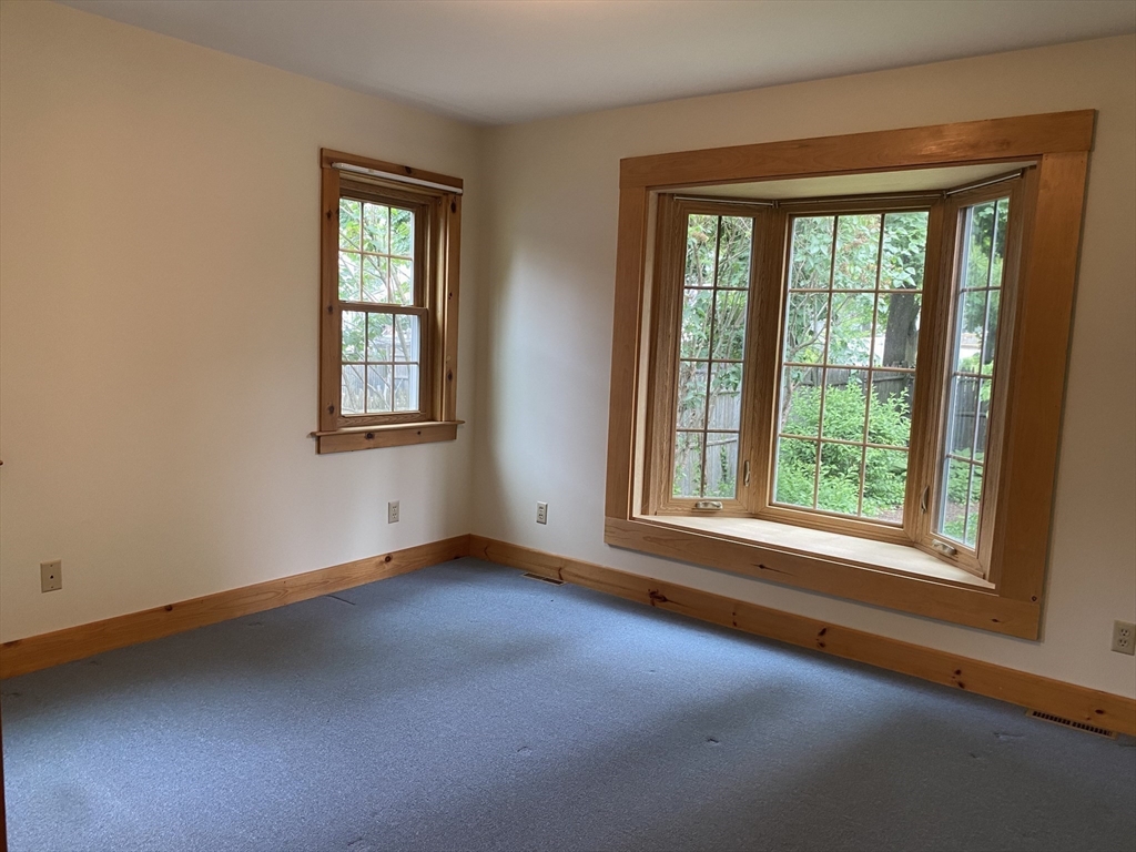 17 Jane Street Randolph, MA 02368 - Photo 9 of 18 an empty room with a window