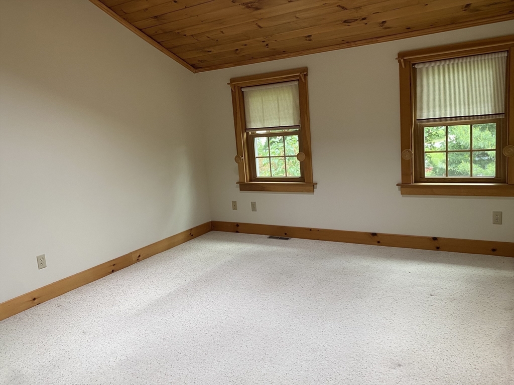 17 Jane Street Randolph, MA 02368 - Photo 10 of 18 an empty room with a window