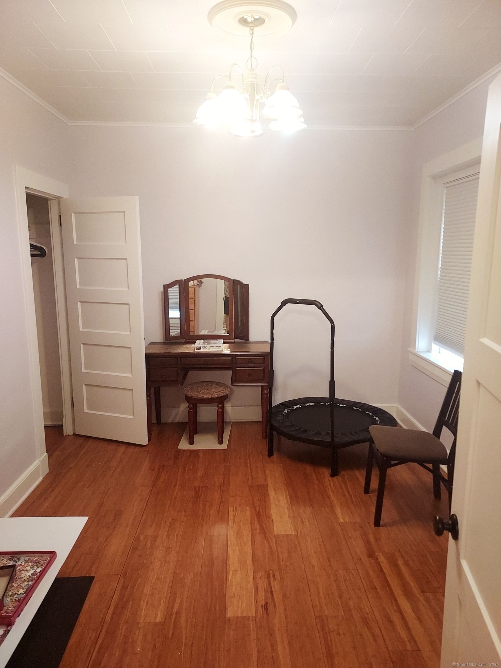 580 Wilmot Avenue, Unit 2 Bridgeport, CT 06607 - Photo 7 of 10 a living room with furniture and a wooden floor