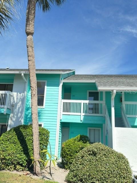 455 Alt 19, Unit 12 Palm Harbor, FL 34683 - Photo 2 of 12 a view of a house with a yard