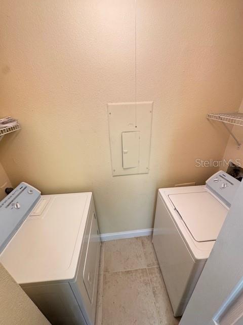 455 Alt 19, Unit 12 Palm Harbor, FL 34683 - Photo 9 of 12 a utility room with dryer and washer