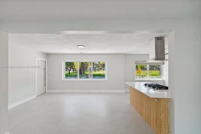 a view of an empty room with window