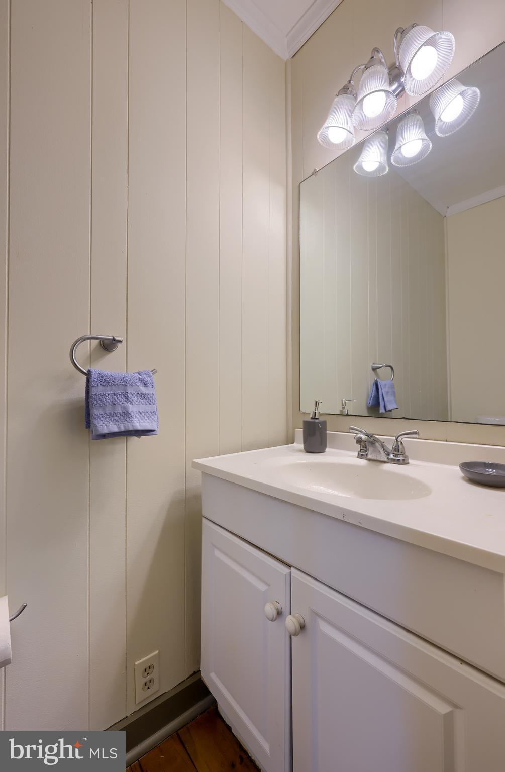 636-640 Doe Run Road Lititz, PA 17543 - Photo 21 of 34 a bathroom with a sink and a mirror