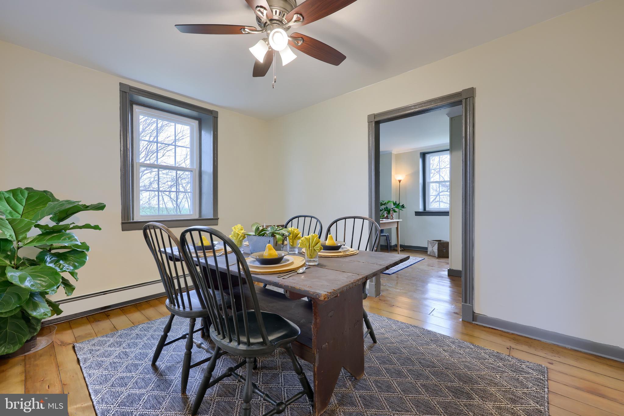 636-640 Doe Run Road Lititz, PA 17543 - Photo 5 of 34 a view of a dining room with furniture and wooden floor