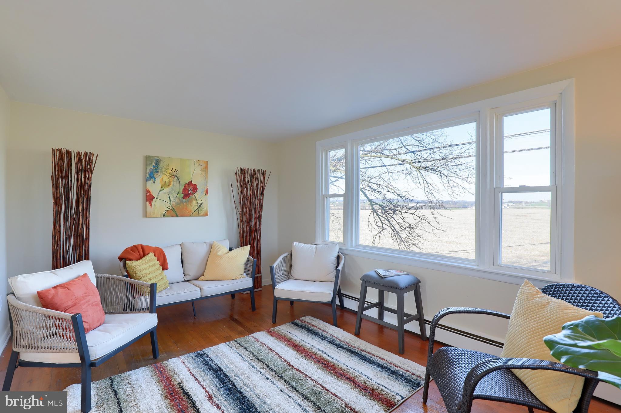 636-640 Doe Run Road Lititz, PA 17543 - Photo 8 of 34 a living room with furniture and a rug