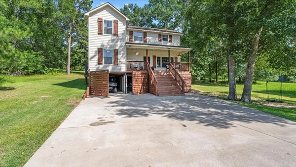 $427,000 | 147 Wildwood Lake Drive, Huntsville, TX 77340