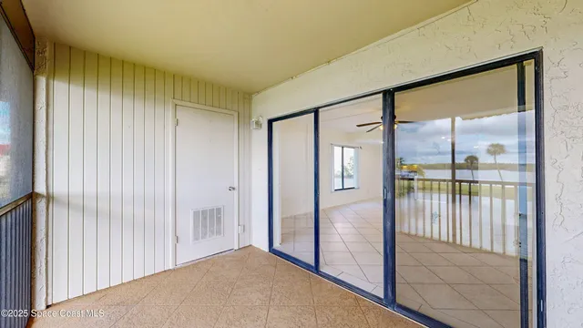 a bathroom with a shower and a window