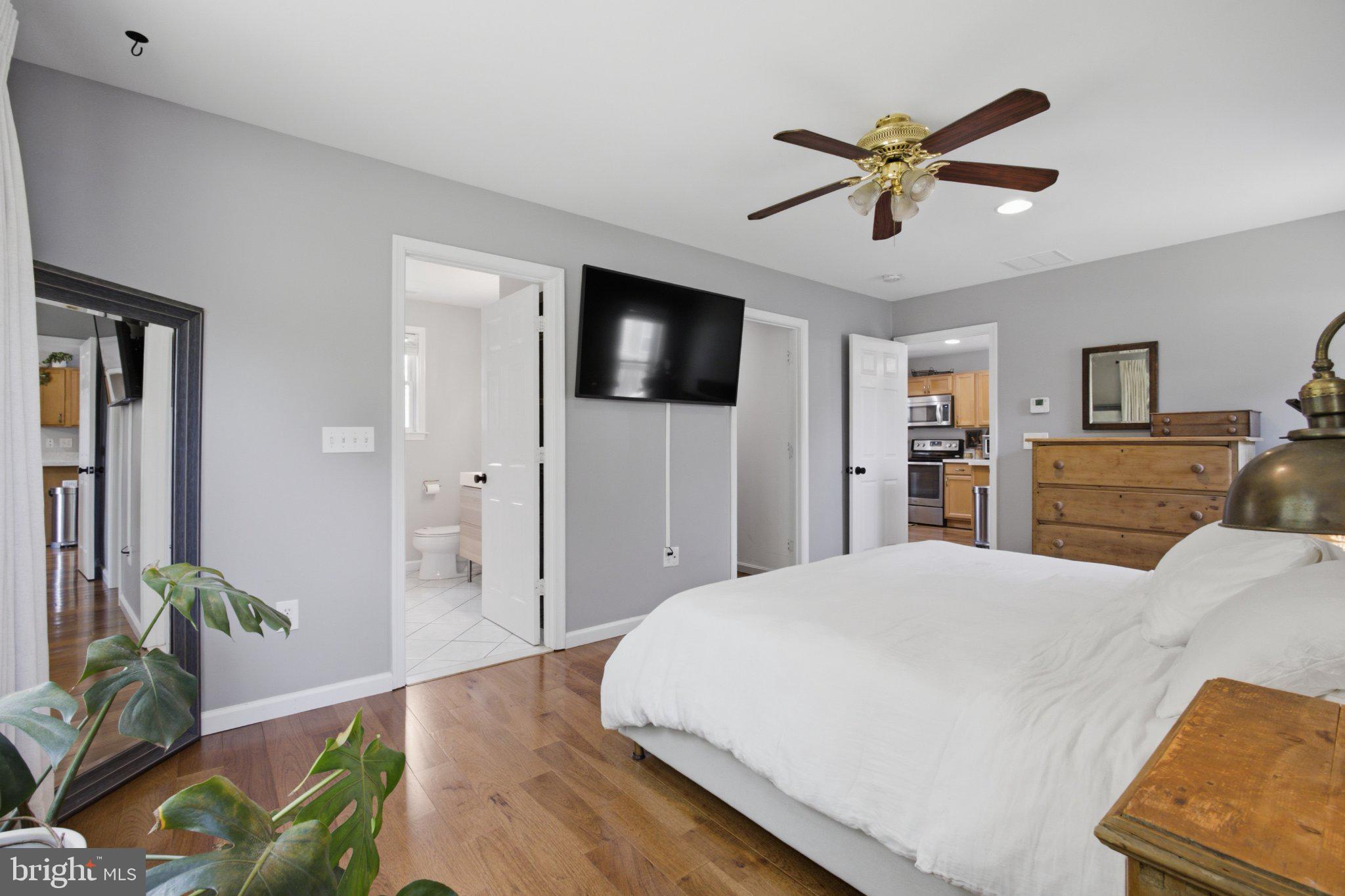 5650 Deale Churchton Road Churchton, MD 20733 - Photo 19 of 31 Serene bedroom with modern touches.