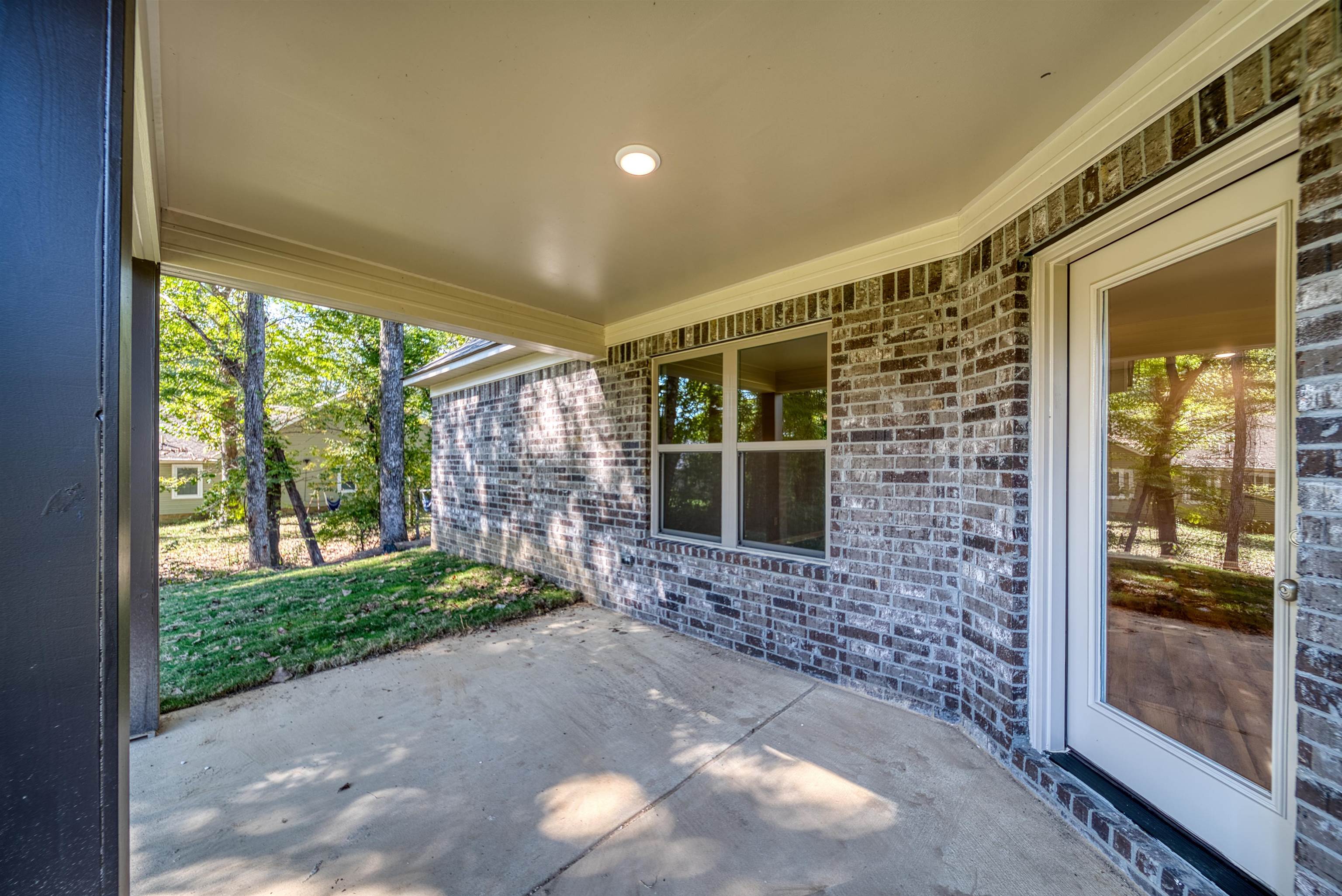109 Walnut Ridge Ripley, TN 38063 - Photo 31 of 39 a front view of a house with a yard