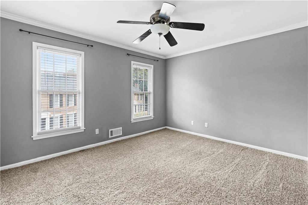 1101 Collier Road Northwest, Unit D5 Atlanta, GA 30318 - Photo 26 of 38 a view of an empty room with a window
