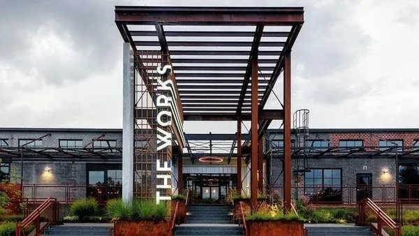 a view of a water fountain in front of building