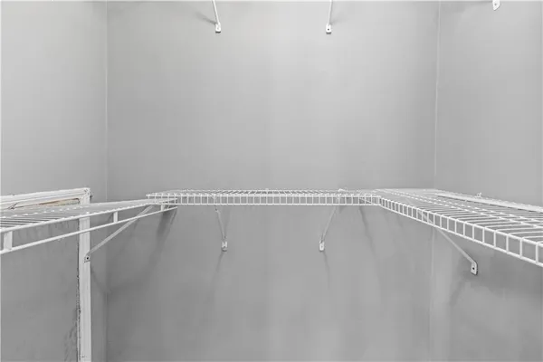 a view of a room with racks on the wall