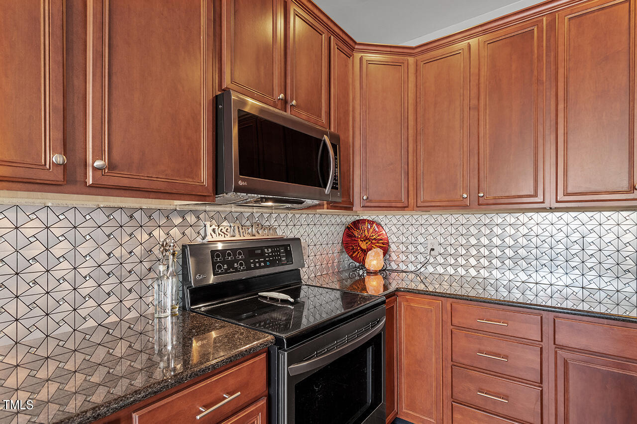 10145 Mizner Lane Raleigh, NC 27617 - Photo 16 of 61 Blending classic features with updated funky style