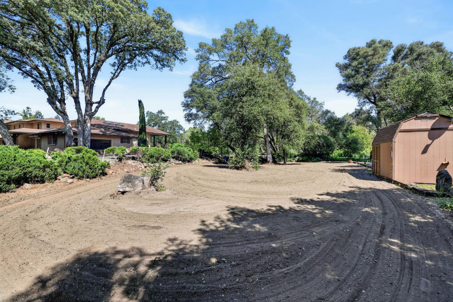 7021 Horseshoe Bar Road Loomis, CA 95650 - Photo 56 of 77 a view of road and with trees