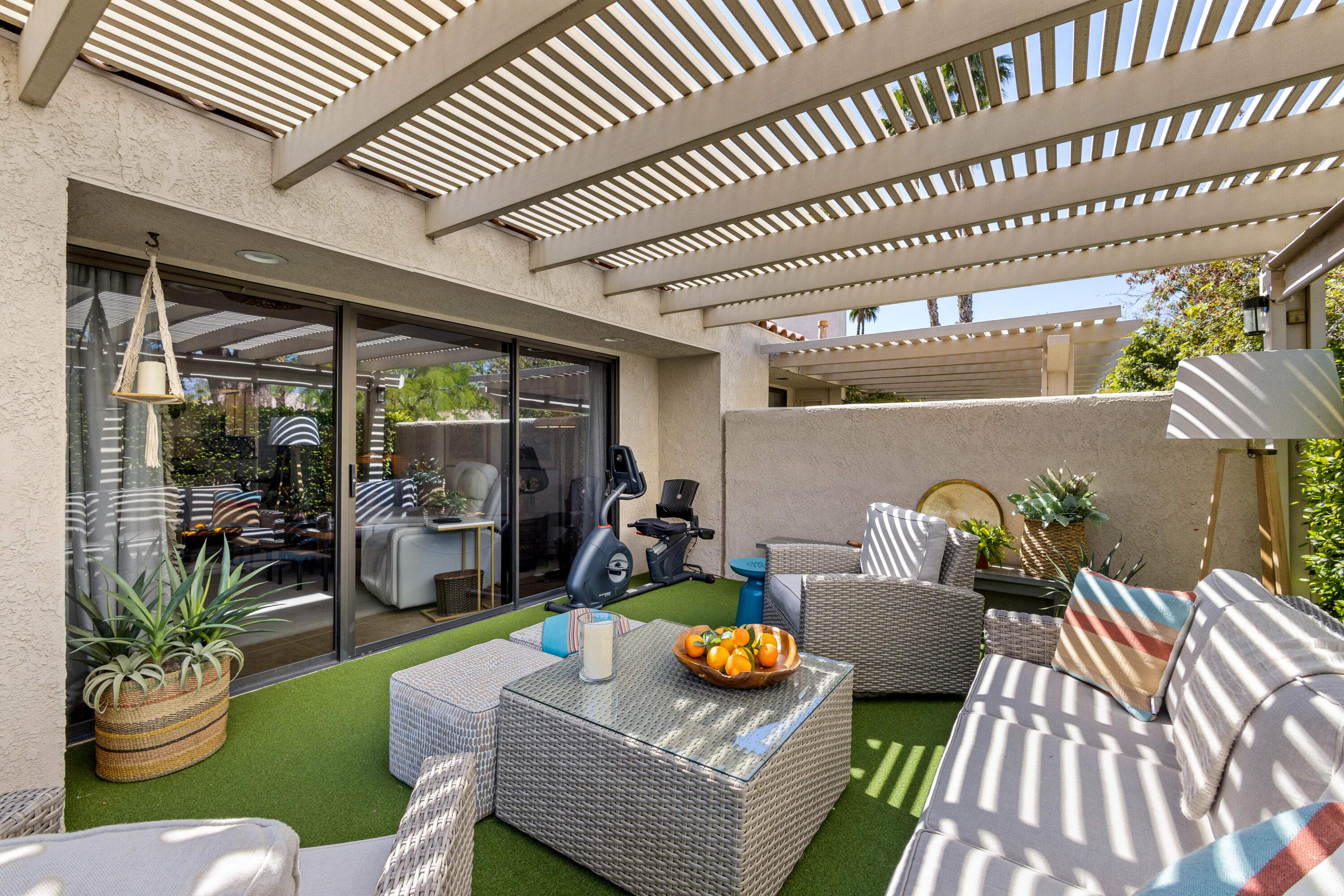 303 Forest Hills Drive Rancho Mirage, CA 92270 - Photo 11 of 72 a outdoor living space with furniture and a fireplace