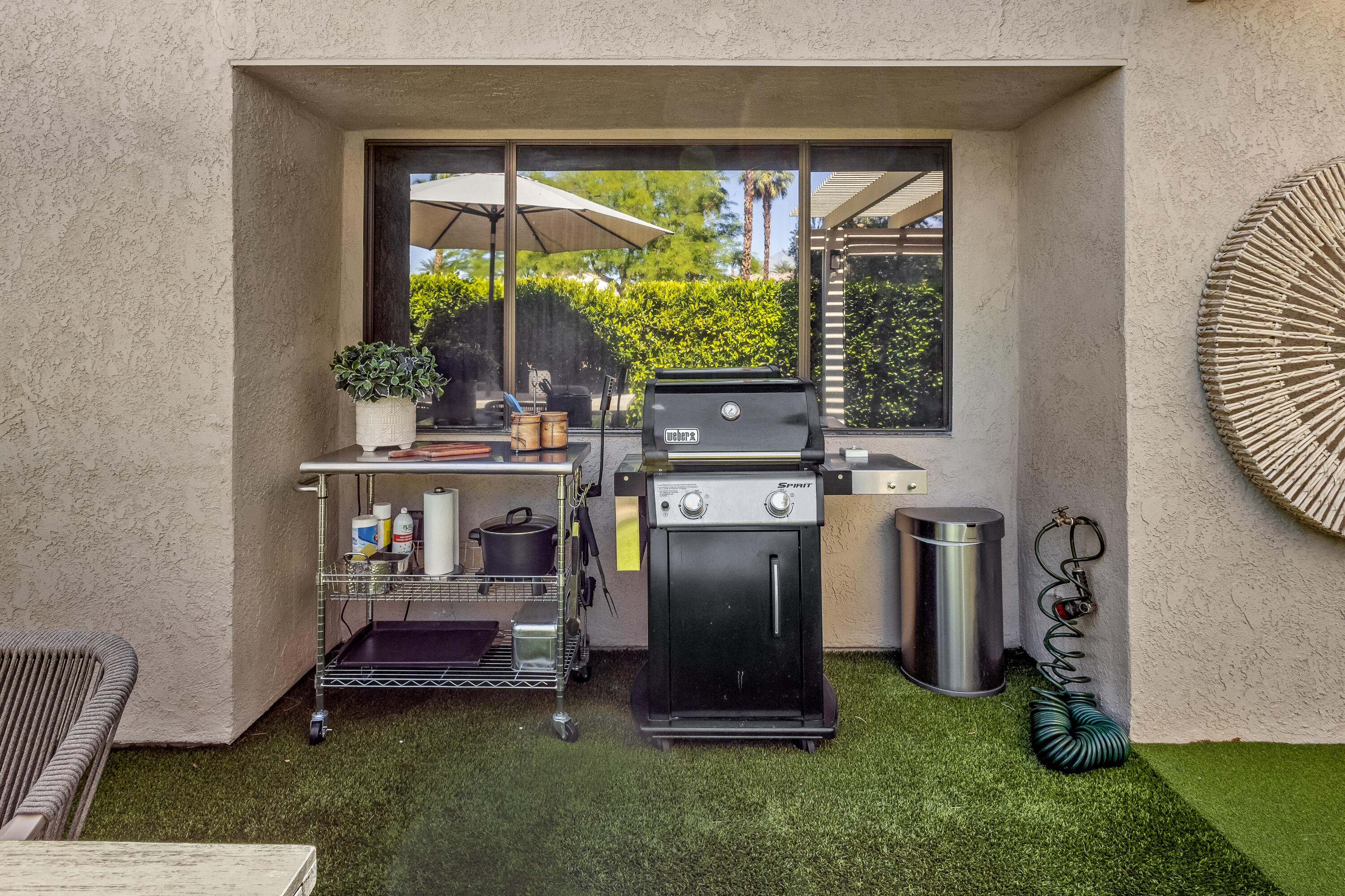 303 Forest Hills Drive Rancho Mirage, CA 92270 - Photo 15 of 72 a kitchen with stainless steel appliances granite countertop a stove a refrigerator and a chair