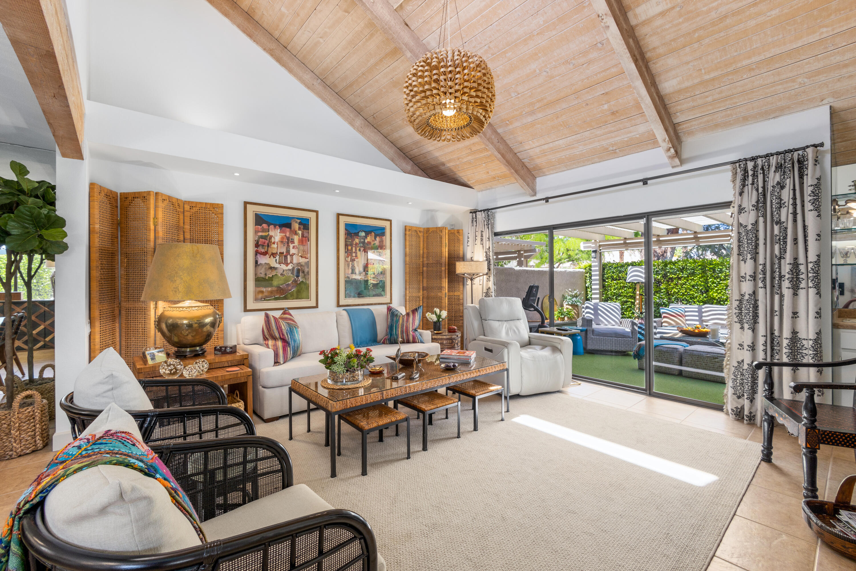 303 Forest Hills Drive Rancho Mirage, CA 92270 - Photo 20 of 72 a living room with furniture and a large window