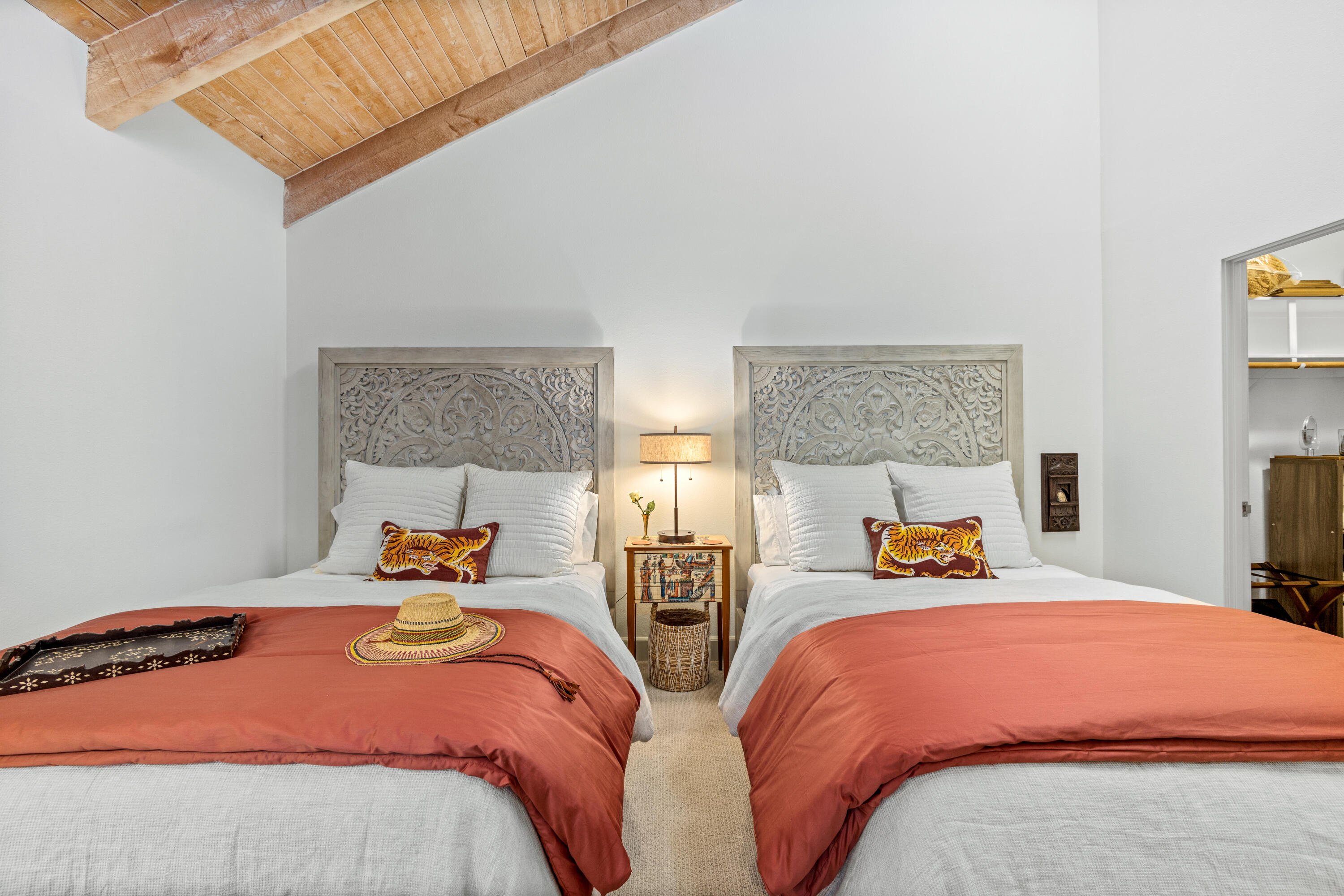 303 Forest Hills Drive Rancho Mirage, CA 92270 - Photo 48 of 72 a bedroom with two beds and lamp