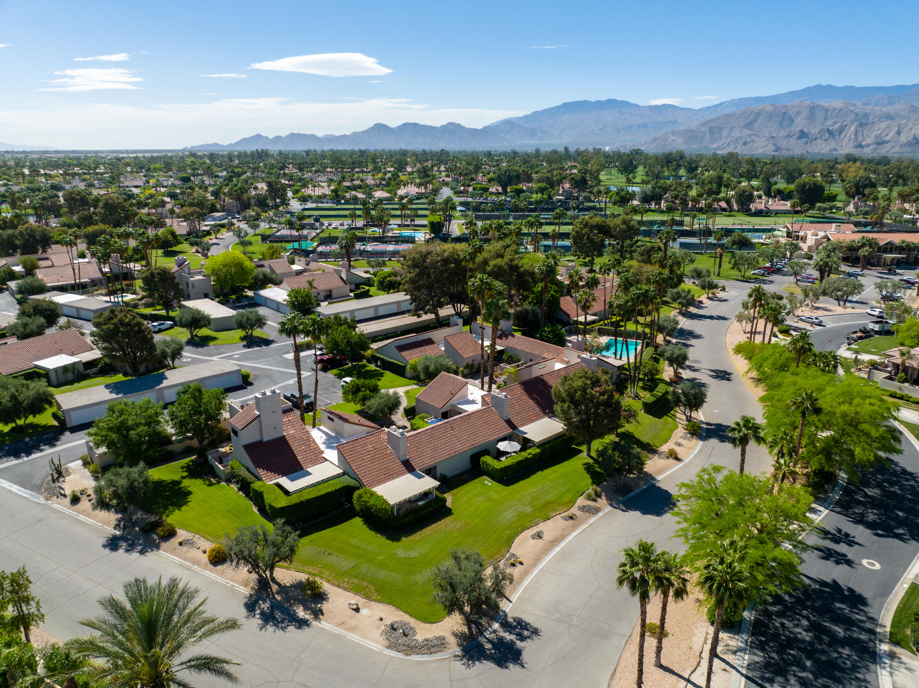 303 Forest Hills Drive Rancho Mirage, CA 92270 - Photo 58 of 72 an aerial view of residential houses with outdoor space and mountains
