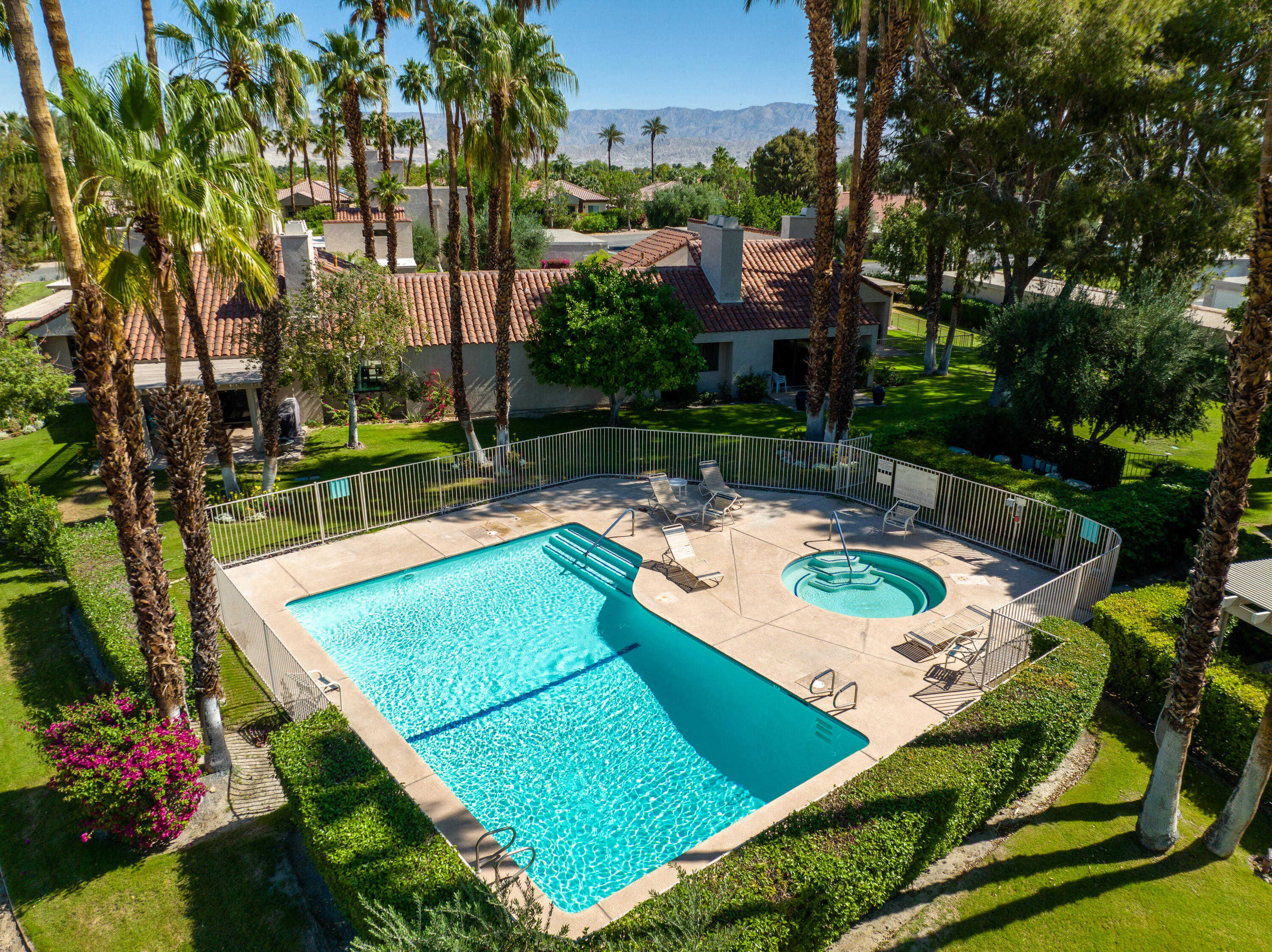 303 Forest Hills Drive Rancho Mirage, CA 92270 - Photo 61 of 72 an aerial view of a house with swimming pool garden and patio