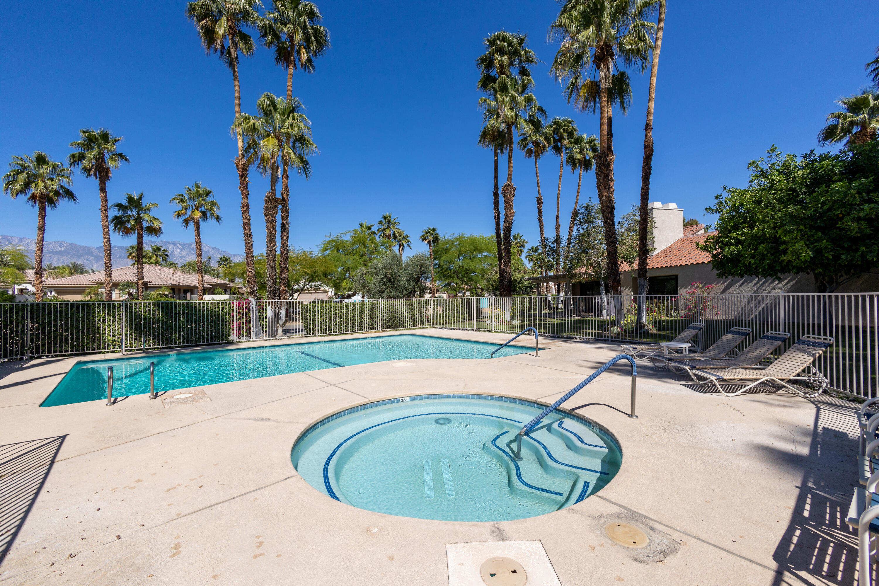 303 Forest Hills Drive Rancho Mirage, CA 92270 - Photo 63 of 72 an outdoor space with pool and furniture