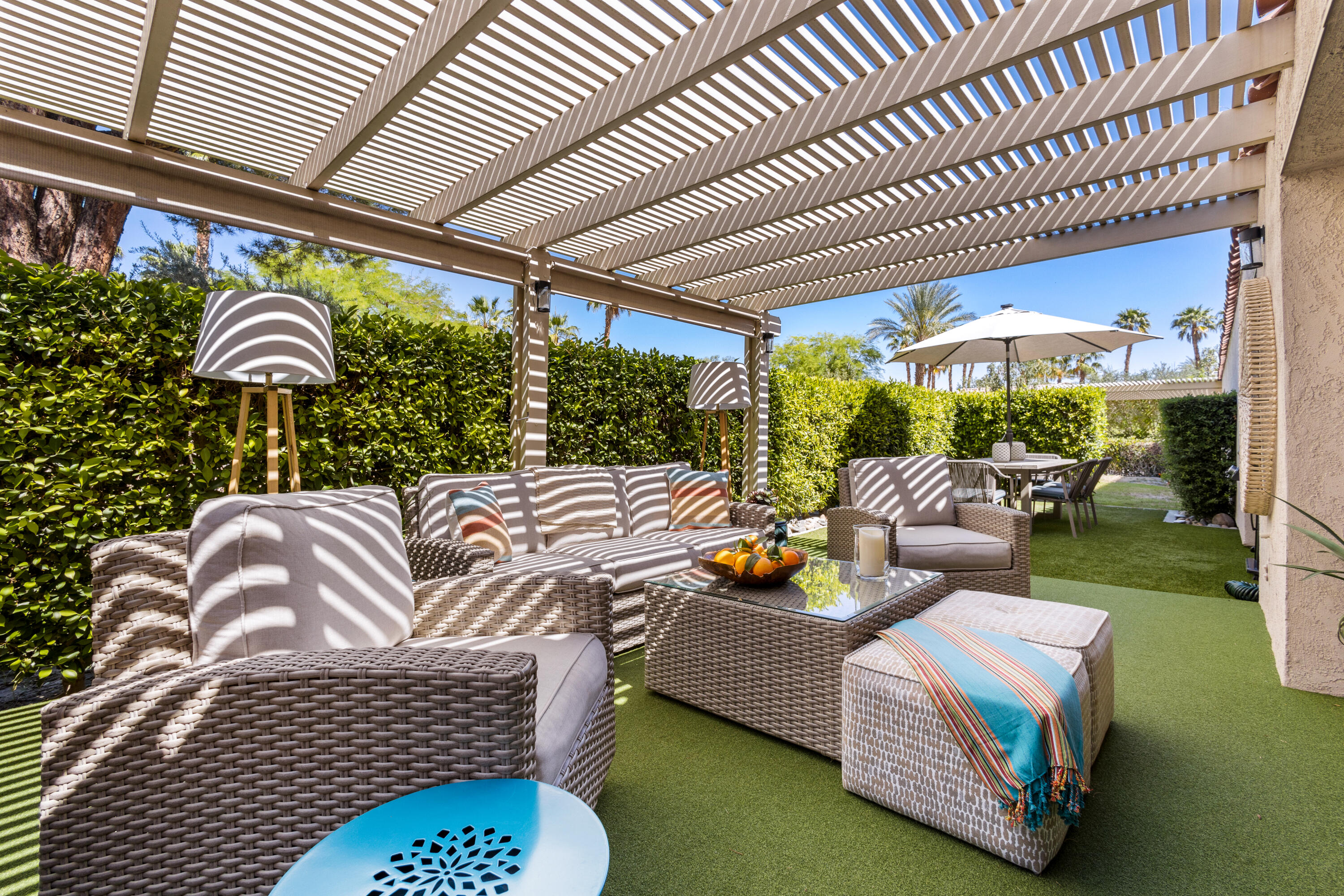 303 Forest Hills Drive Rancho Mirage, CA 92270 - Photo 9 of 72 a outdoor living space with furniture and garden