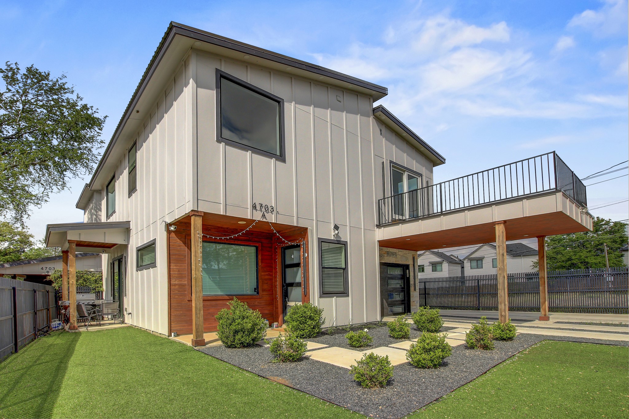Rear view of house with board and batten siding