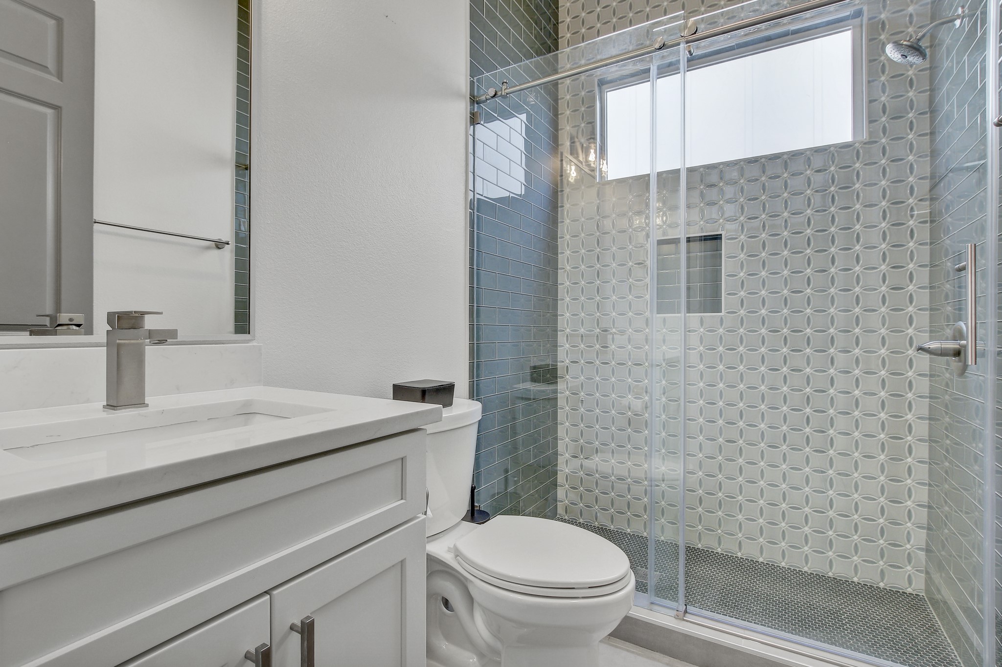 4703 Louis Avenue, Unit A Austin, TX 78721 - Photo 15 of 35 Full bath featuring vanity and a shower stall