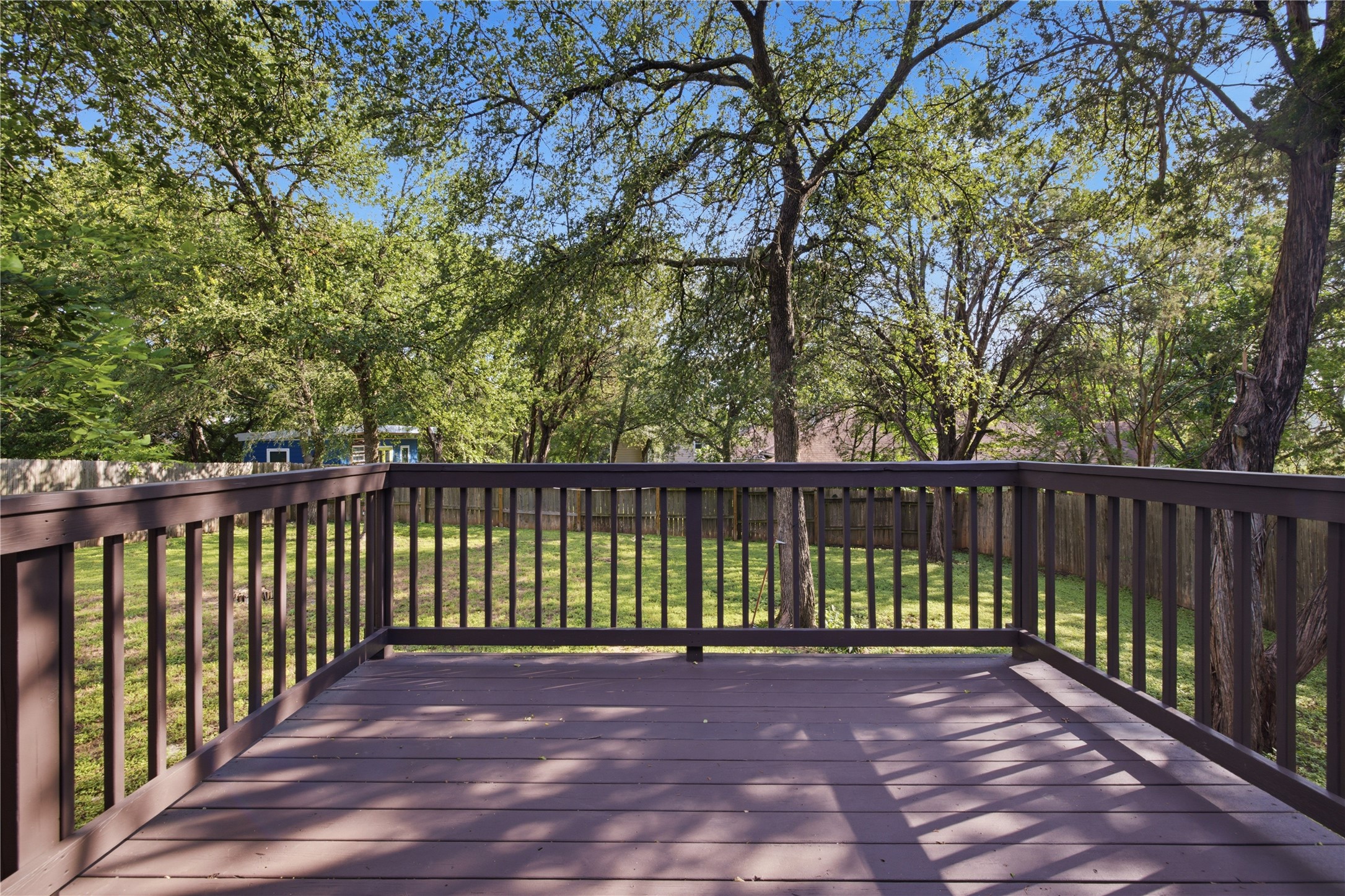 2922 Wickersham Lane Austin, TX 78741 - Photo 12 of 26 a view of a yard with wooden fence