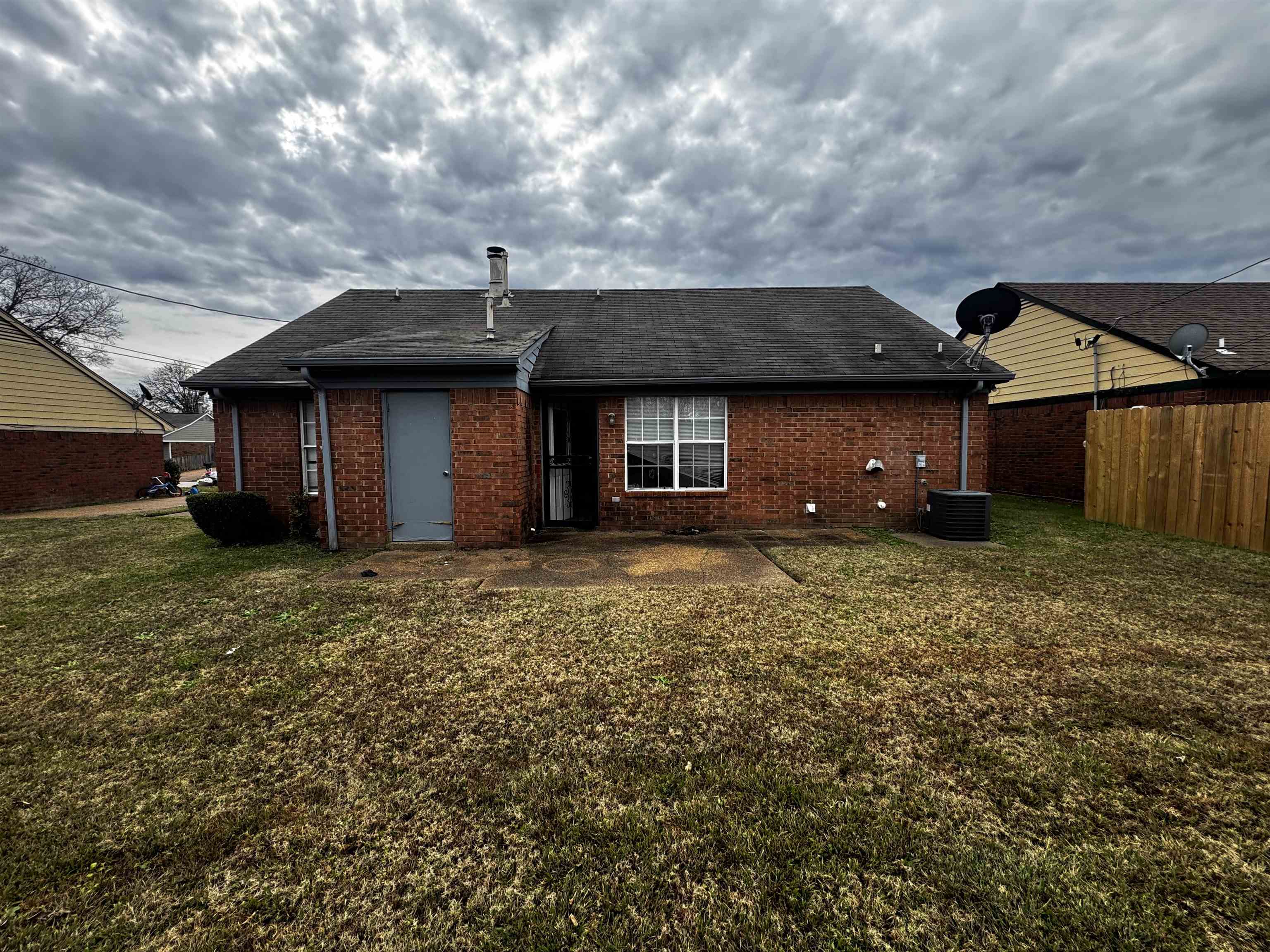 5840 Hickory Shadow Lane Memphis, TN 38141 - Photo 11 of 11 a front view of a house with a garden