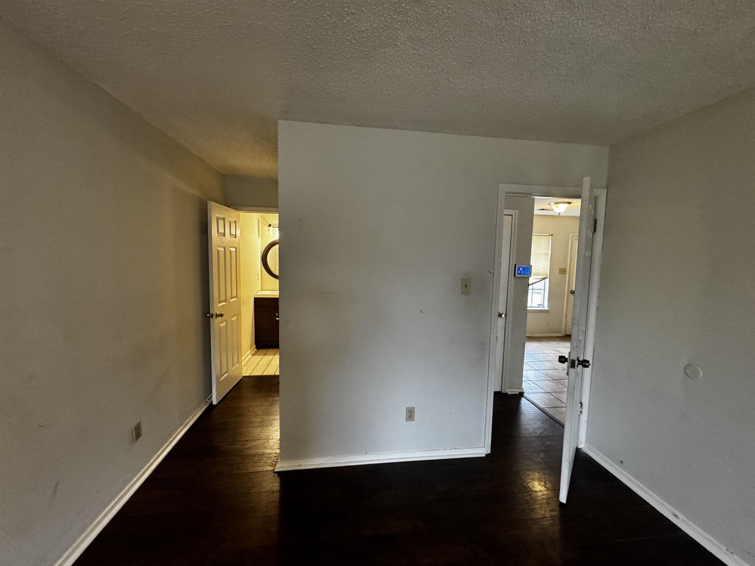 5840 Hickory Shadow Lane Memphis, TN 38141 - Photo 4 of 11 an empty room with wooden floor and windows