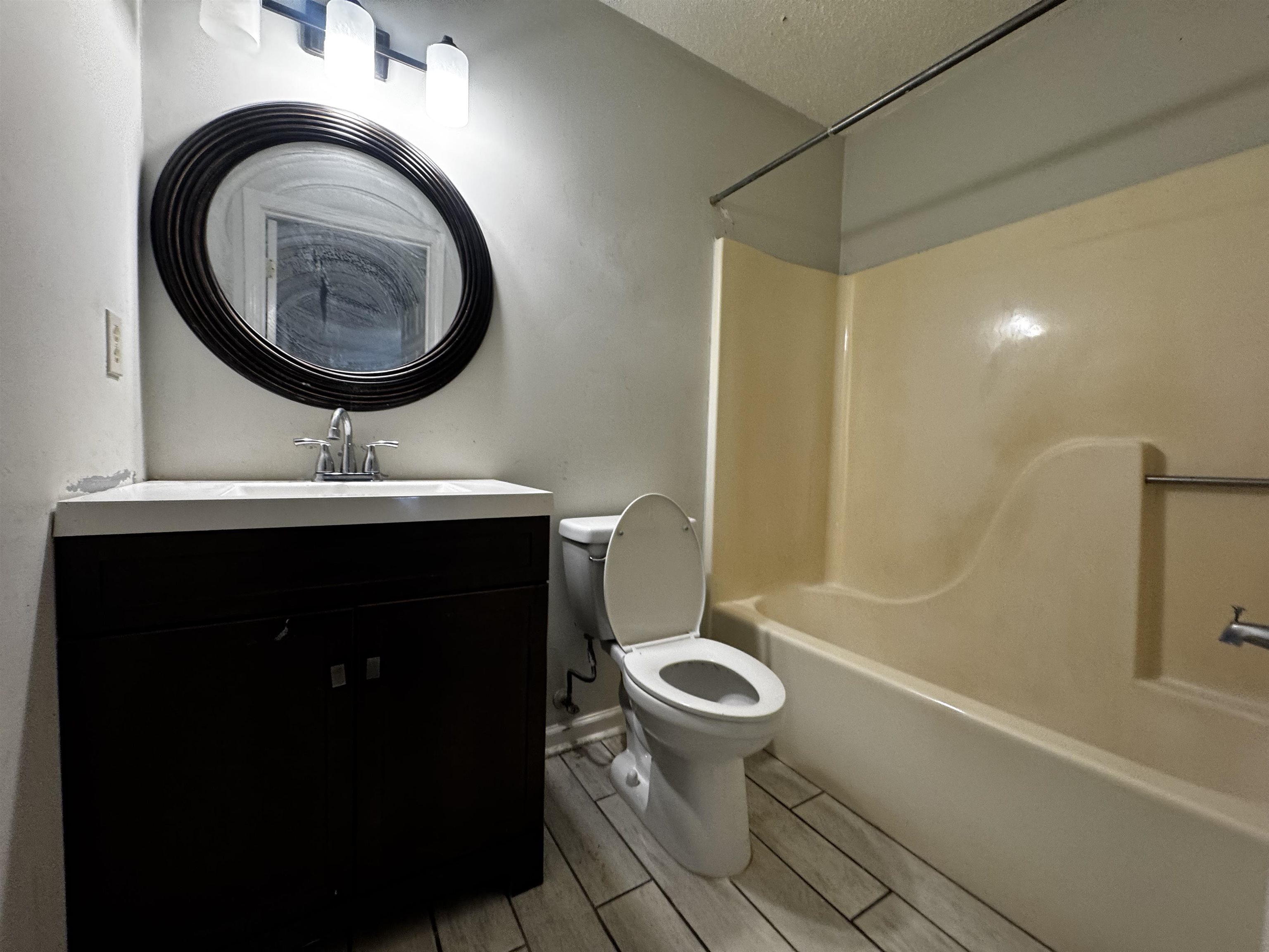 5840 Hickory Shadow Lane Memphis, TN 38141 - Photo 6 of 11 a bathroom with a sink and a mirror